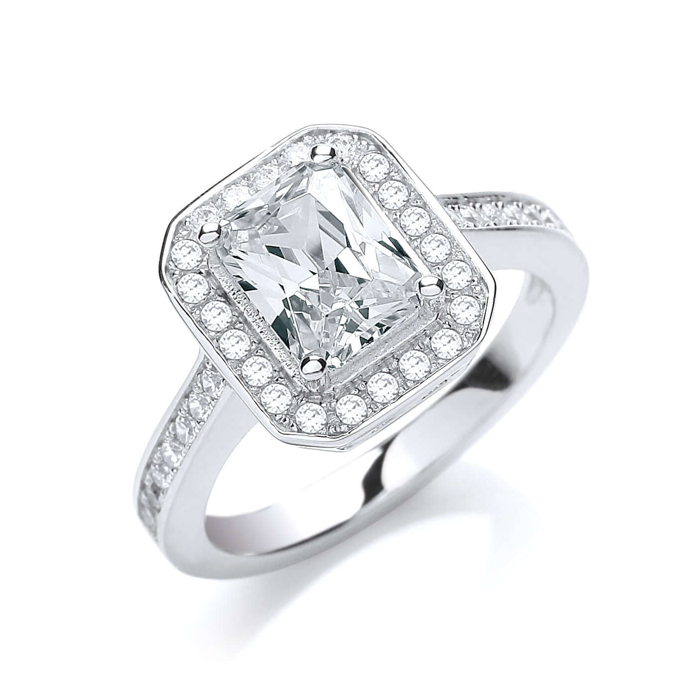 Emerald Shaped Cz Engagement ring in sterling silver with emerald cut cubic zirconia and halo setting.