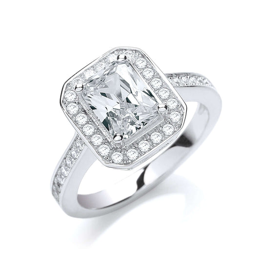 Emerald Shaped Cz Engagement ring in sterling silver with emerald cut cubic zirconia and halo setting.