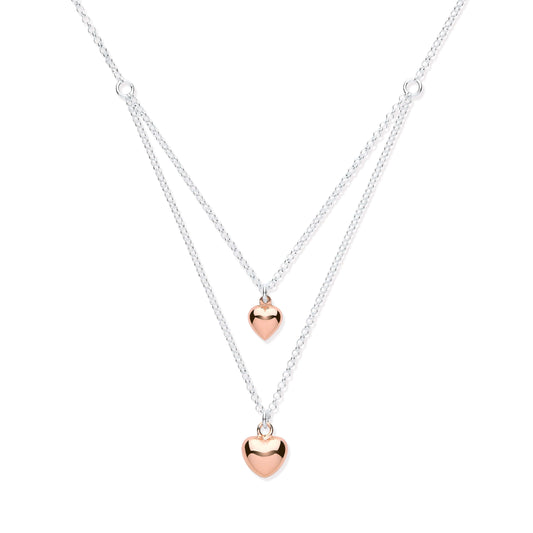 Silver Hearts Necklace with rose gold plated hearts, 16 inch chain, featuring large and small heart pendants.