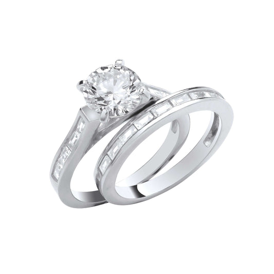 Silver Bridal Set featuring cubic zirconia engagement and wedding rings with baguette cut stones.
