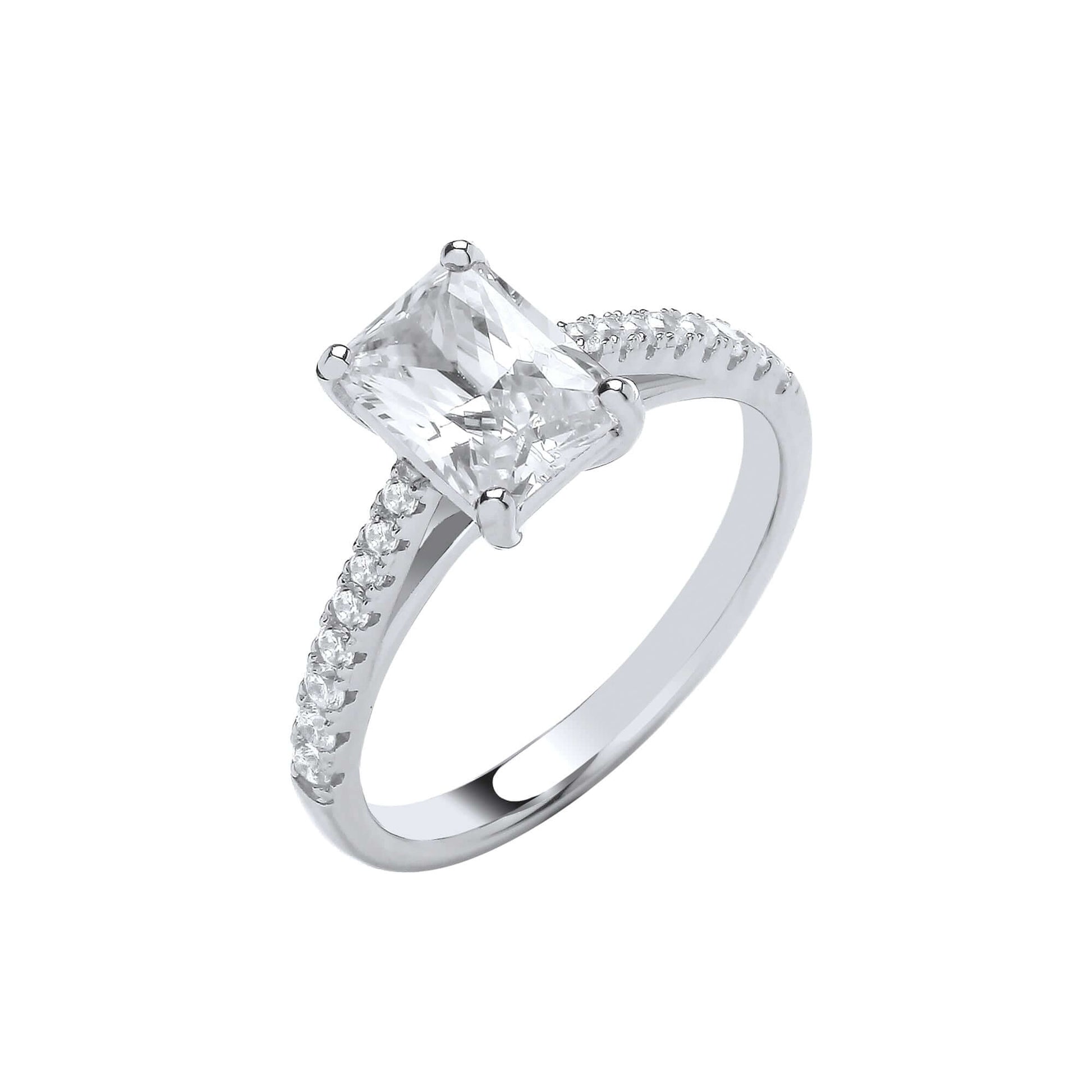 Silver Engagement Ring with emerald cut cubic zirconia center stone and brilliant cut stones on shoulders