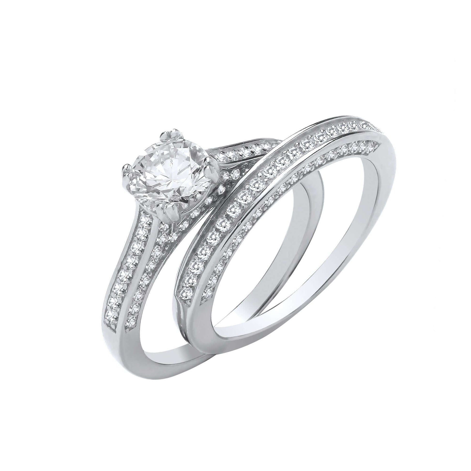 Silver Bridal Set featuring a solitaire brilliant cut cubic zirconia ring with channel set shoulders and wedding band.