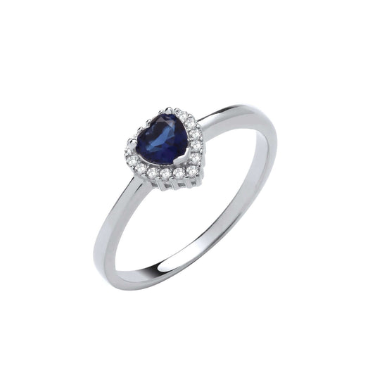 Silver Blue Heart Halo Ring featuring a sapphire blue heart with a halo of cubic zirconia stones set in sterling silver.